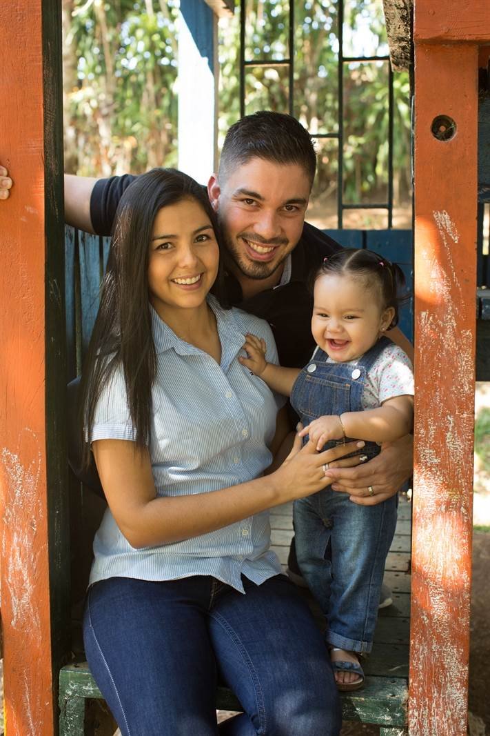 couple holding baby