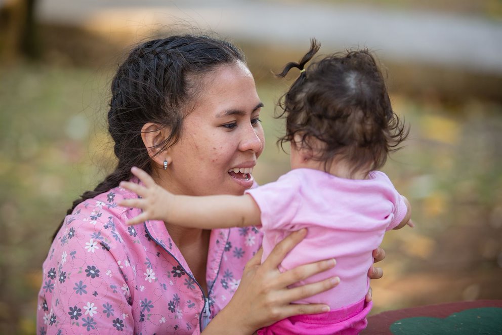 lady holding baby