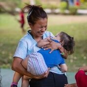 lady holding baby