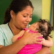 lady nursing child